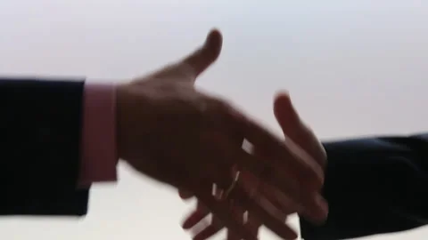 Closeup of handshake between two businessmen Stock Footage