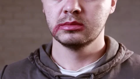 Closeup of handsome bearded man getting makeup. Lgbt concept Stock Footage 165069297