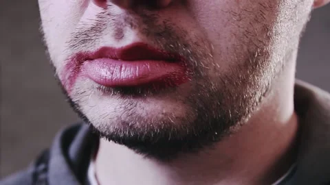 Closeup of handsome bearded man getting makeup. Lgbt concept Stock Footage 165069309