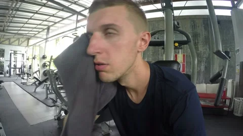 Closeup of Handsome Tired Young Man in Gym after Workout Видео 67289460