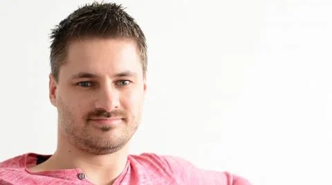 Closeup of handsome young man thinking in his flat. Stock Footage 53746933