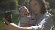 Closeup Of Happy Mom Taking A Selfie With Her Smiley Baby Girl In The Park Stock Footage