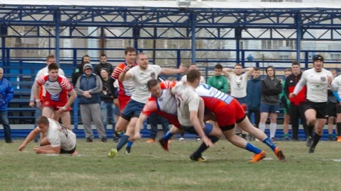 Closeup of hard blocking a forward by defenders in a game Stock Footage 89828333