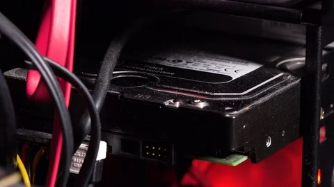 Closeup on a hard drive disk of a computer 스톡 동영상 87935349