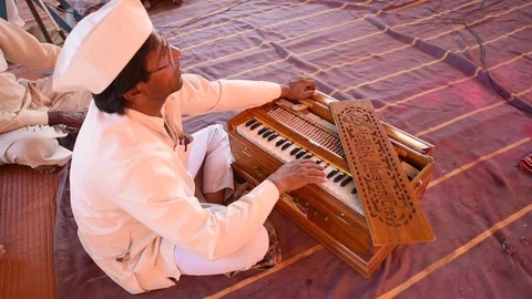 Closeup of harmonium artist Stock Footage 77192908