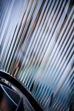 Closeup of headlight of car. Stock Photos