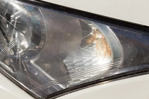 Closeup headlights of car.modern light element. Stock Photos