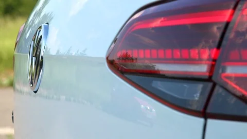 Closeup on a hidden reverse parking camera on a Volkswagen car Stock Footage 92407349