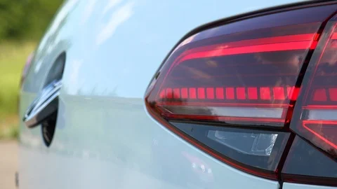 Closeup on a hidden reverse parking camera on a Volkswagen car Stock Footage 92407362