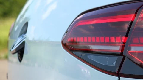Closeup on a hidden reverse parking camera on a Volkswagen car Stock Footage 92407386
