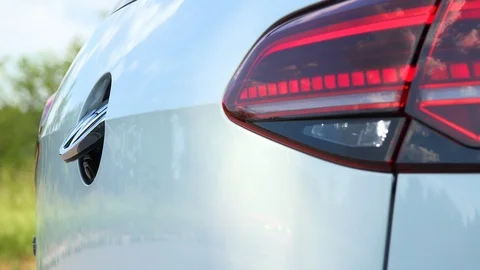 Closeup on a hidden reverse parking camera on a Volkswagen car Stock Footage 92407407