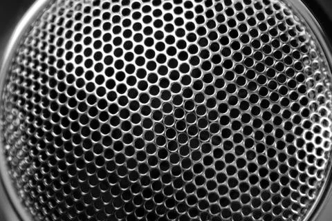Closeup of holes in grill pattern Stock Photos