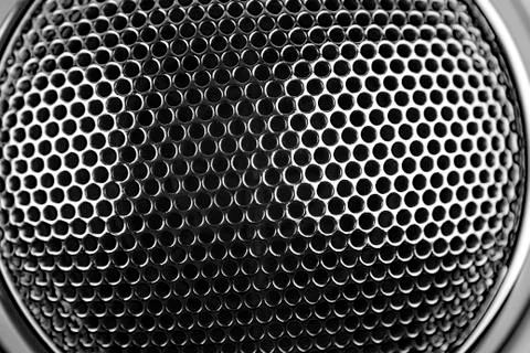 Closeup of holes in grill pattern Stock Photos