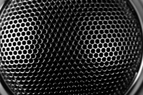 Closeup of holes in grill pattern Stock Photos