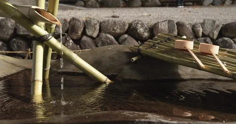 Closeup of holy spring water for cleansing ritual, Japan (B). Stock Footage 122870600