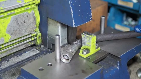Closeup of hose cutting machine, operator repairing damaged hose, static Stock Footage 197755163