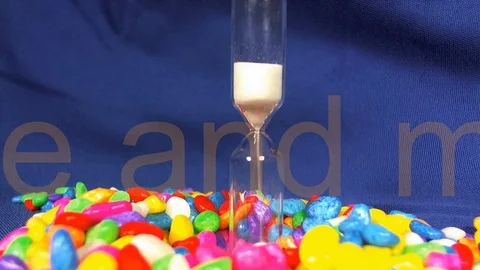 Closeup of hourglass measuring the passing time in a countdown Stock Footage 90305219