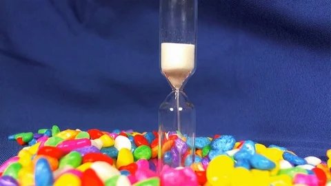 Closeup of hourglass measuring the passing time in a countdown Stock Footage 90346859