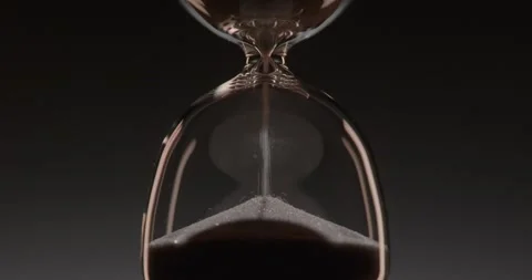 Closeup of hourglass over a dark dramatic background. Stock Footage 327145839