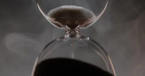 Closeup of hourglass over a dark dramatic background. Stock Footage 327146092