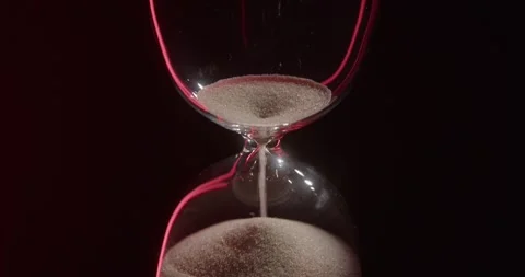 Closeup of hourglass over a dark dramatic background. Stock Footage 327146116