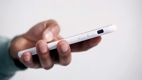 Closeup of human hand hold white smartphone screen Video stock 342519340