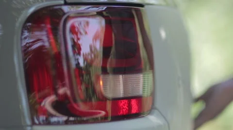 Closeup human hand opening car trunk Stock Footage 66883216
