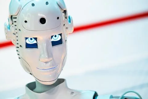 Closeup of human robot looking away Stock Photos