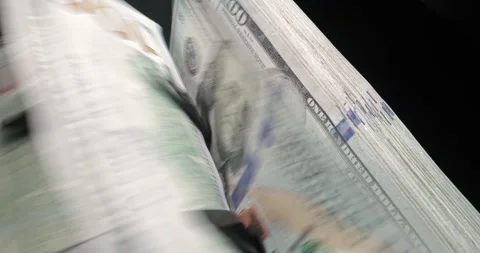 Closeup of hundred dollar bill banknotes flipping through in counting machine Stock-Footage 251979707