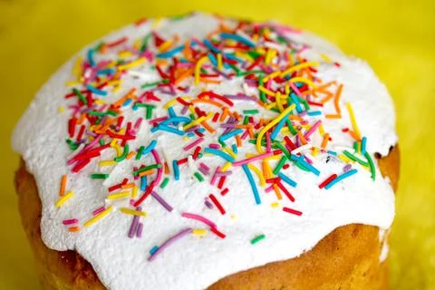 Closeup of icing on traditional Slavic Easter cake decorated with sprinkles Stock Photos