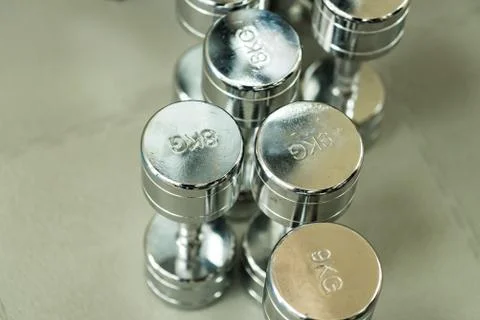 Closeup image of chrome dumbbells Foto stock