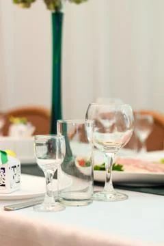 Closeup image of empty stemware standing on a table Stock Photos