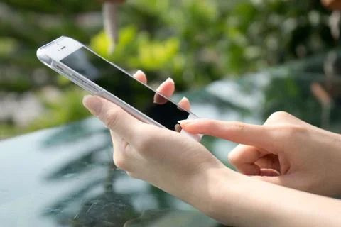 Closeup image of a female hands using smartphone Stock Photos