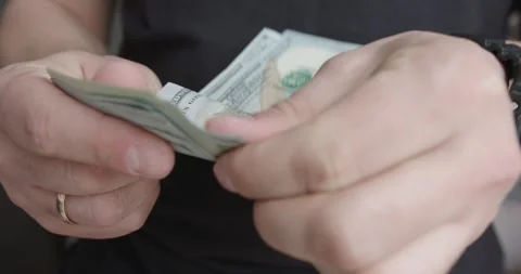 CloseUp Image of Hands Counting Cash and Banknotes in Detail Vídeos de archivo 303978250