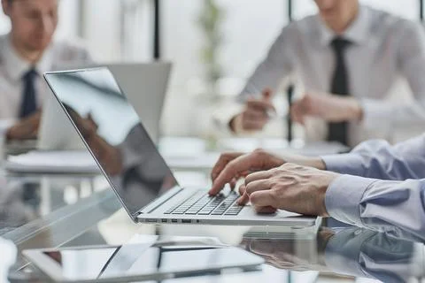 Closeup image of hands using and typing on laptop 스톡 사진