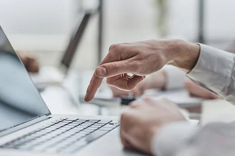 Closeup image of hands using and typing on laptop Stock Photos