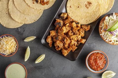 Closeup image of a Mexican taco dish with corn tortillas, precooked, preseaso Stock Photos