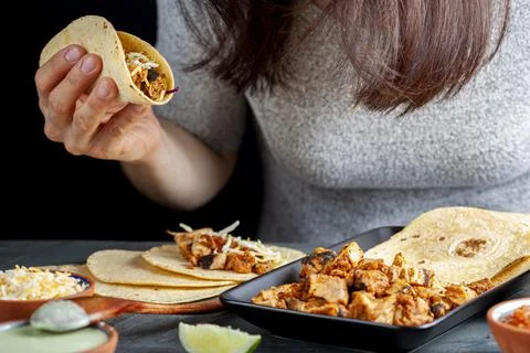 Closeup image of a Mexican taco dish with corn tortillas, precooked, preseaso Stock Photos