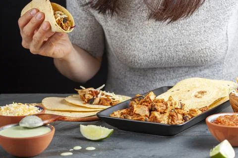 Closeup image of a Mexican taco dish with corn tortillas, precooked, preseaso Stock Photos