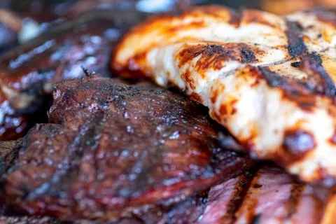 Closeup image of a mixed grill, various meats Stock Photos