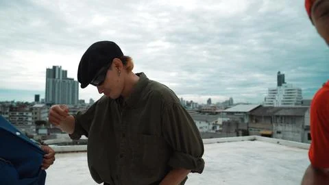 Closeup image of profession hipster dancing break dance at rooftop. Endeavor. 写真素材