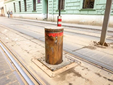 Closeup image of rusty and damaged automatic barrier for preventing car driving Stock Photos