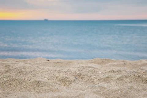 Closeup image of sand, sea and morning sky. Perfect place for home office. Stock Photos