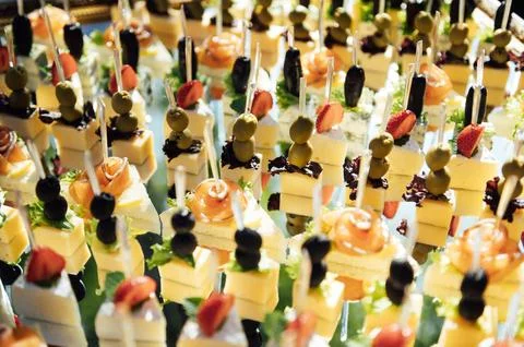 The closeup image of the various small cup cakes on mirror plate Stock Photos