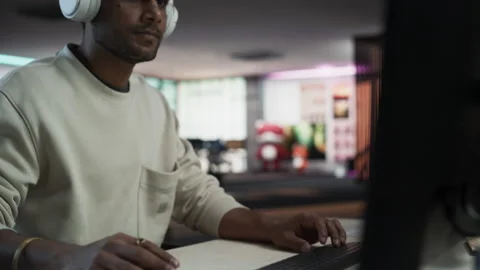 Closeup Of Indian Game Developer Using Computer In Office Stock Footage 255796818