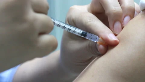 Closeup of injection vaccine Stock Footage 147241040