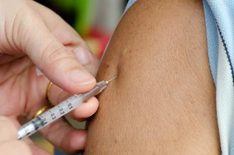 Closeup of injection vaccine Stock Photos