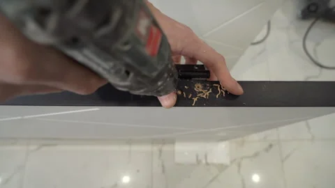 Closeup of installation of interior hinges in interior doors Video stock 264035100