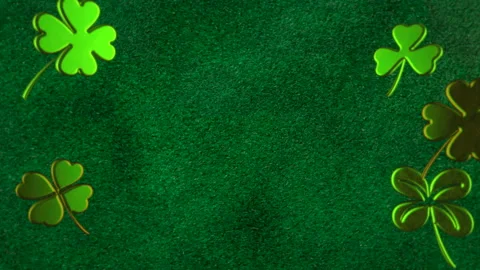 Closeup Irish shamrocks pattern on green texture Stock Footage 232835198