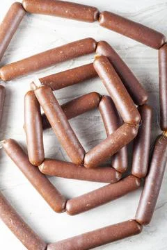 Closeup isolated image of strings of homemade sucuk or sausage stuffed in cas Stock-Fotos